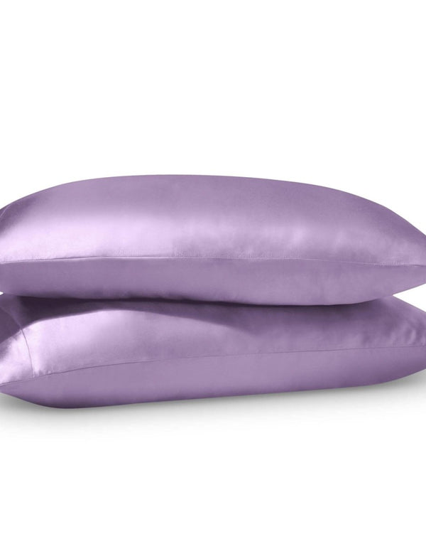 2 satin pillowcases on pillows stacked