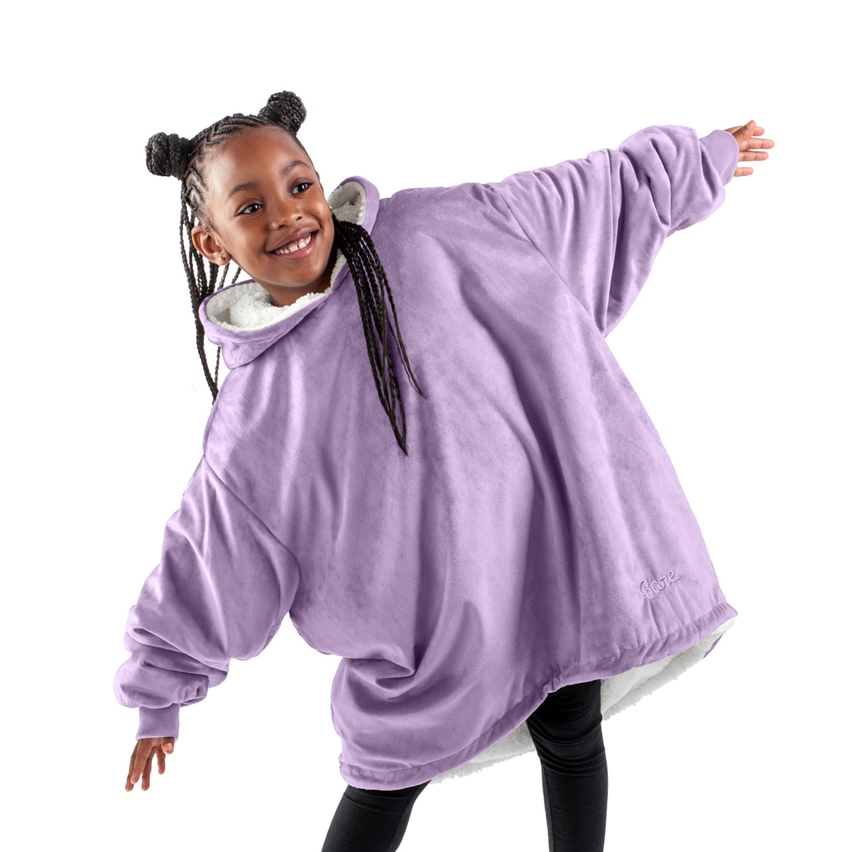 A child with a sherpa wearable blanket on