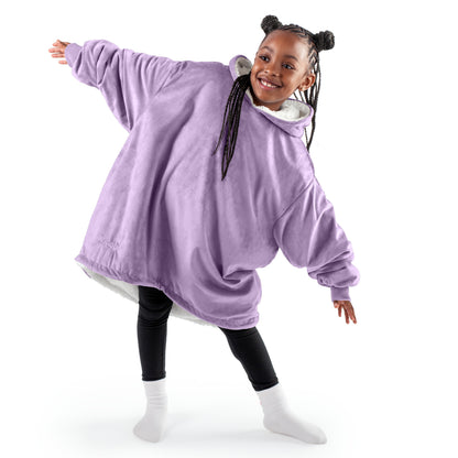 A youth wearable blanket on a child