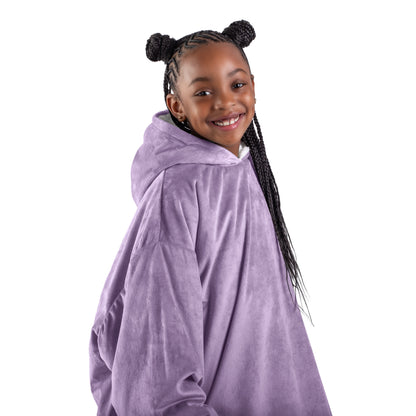 Close up of a sherpa wearable blanket on a child