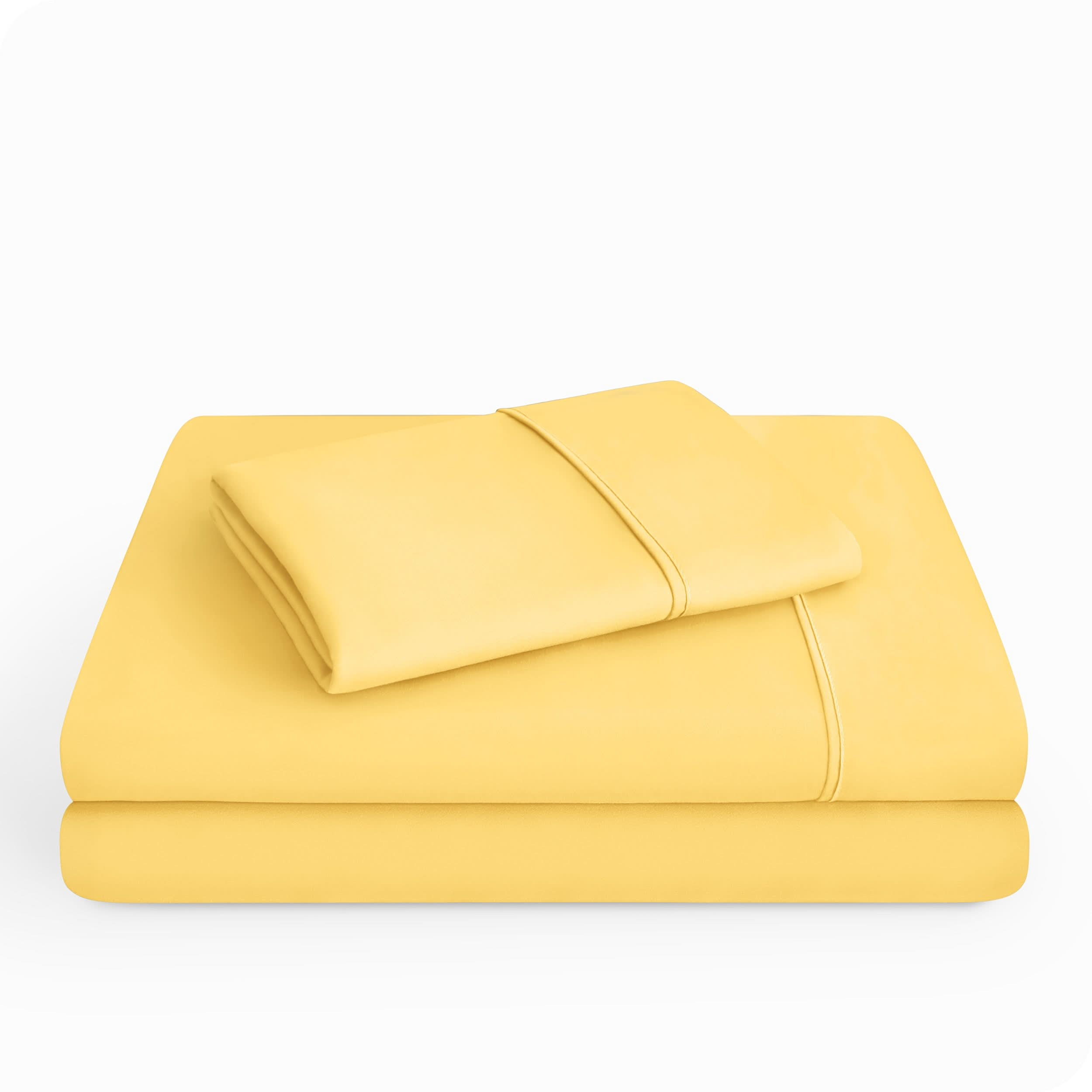 Microfiber sheet set folded and stacked neatly.