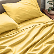Close up of ultra-soft sheets on a bed