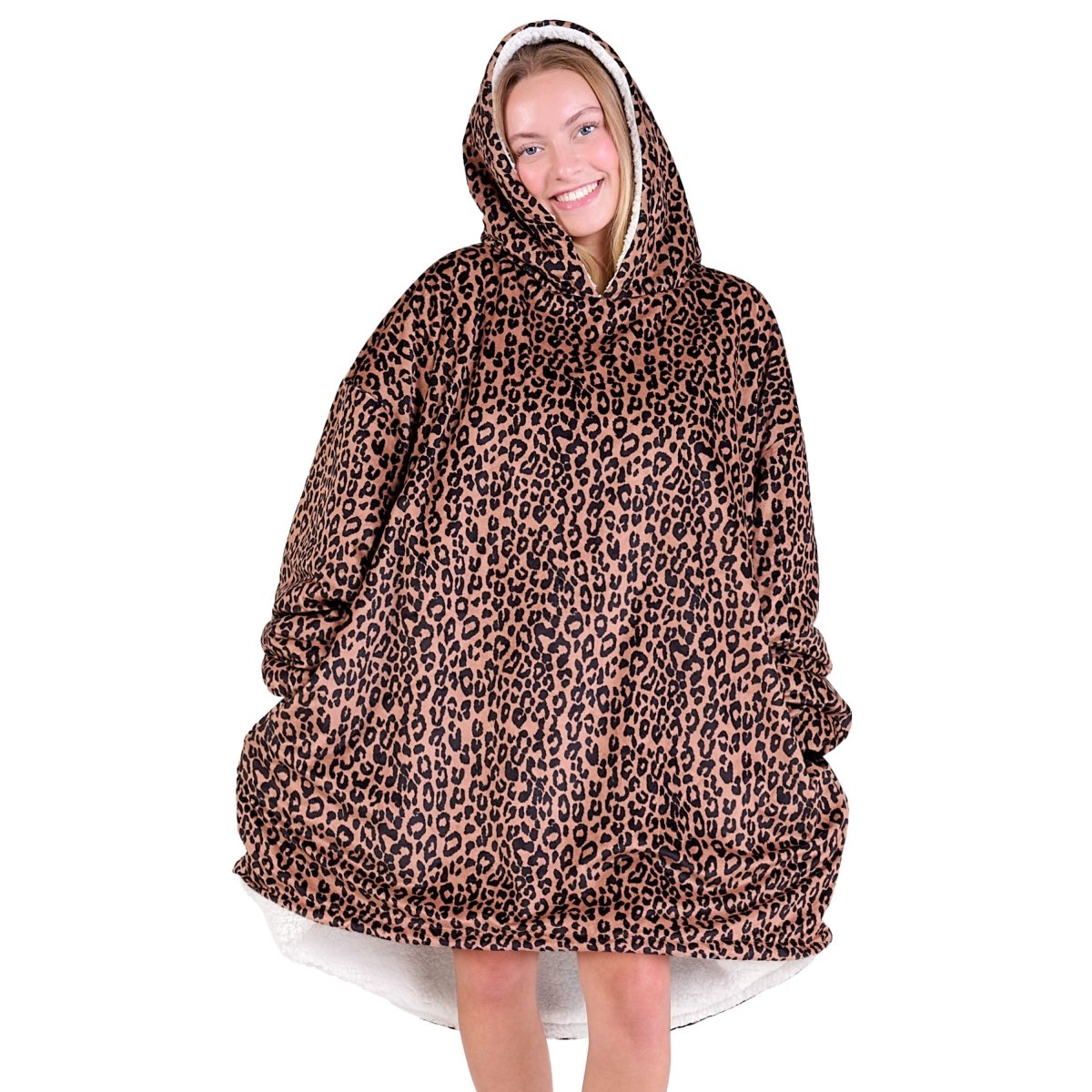 An adult with a sherpa wearable blanket on