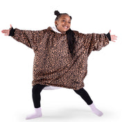 A child wearing a hooded blanket