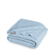 A cotton waffle blanket folded