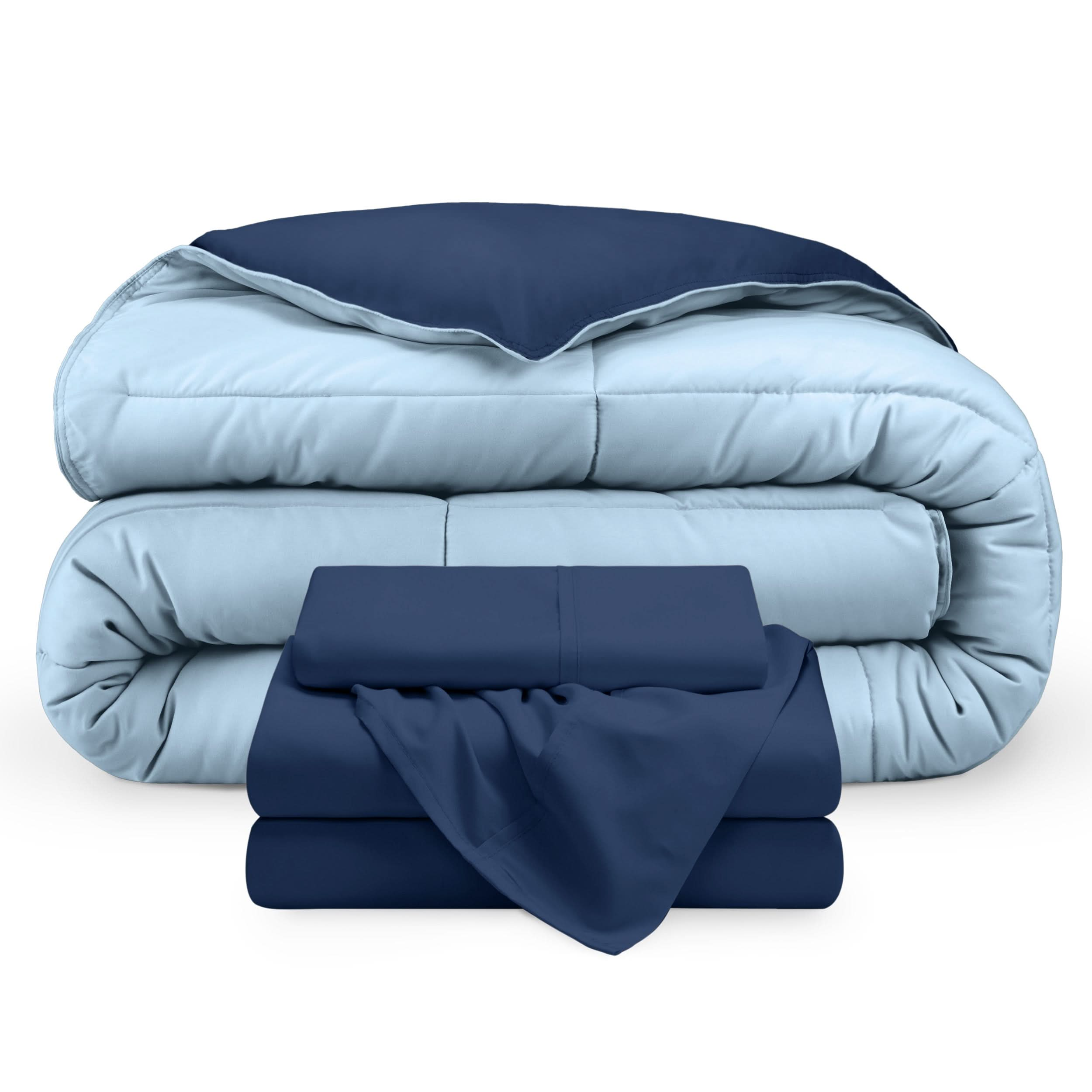 A reversible microfiber comforter and a coordinating sheet set folded and stacked