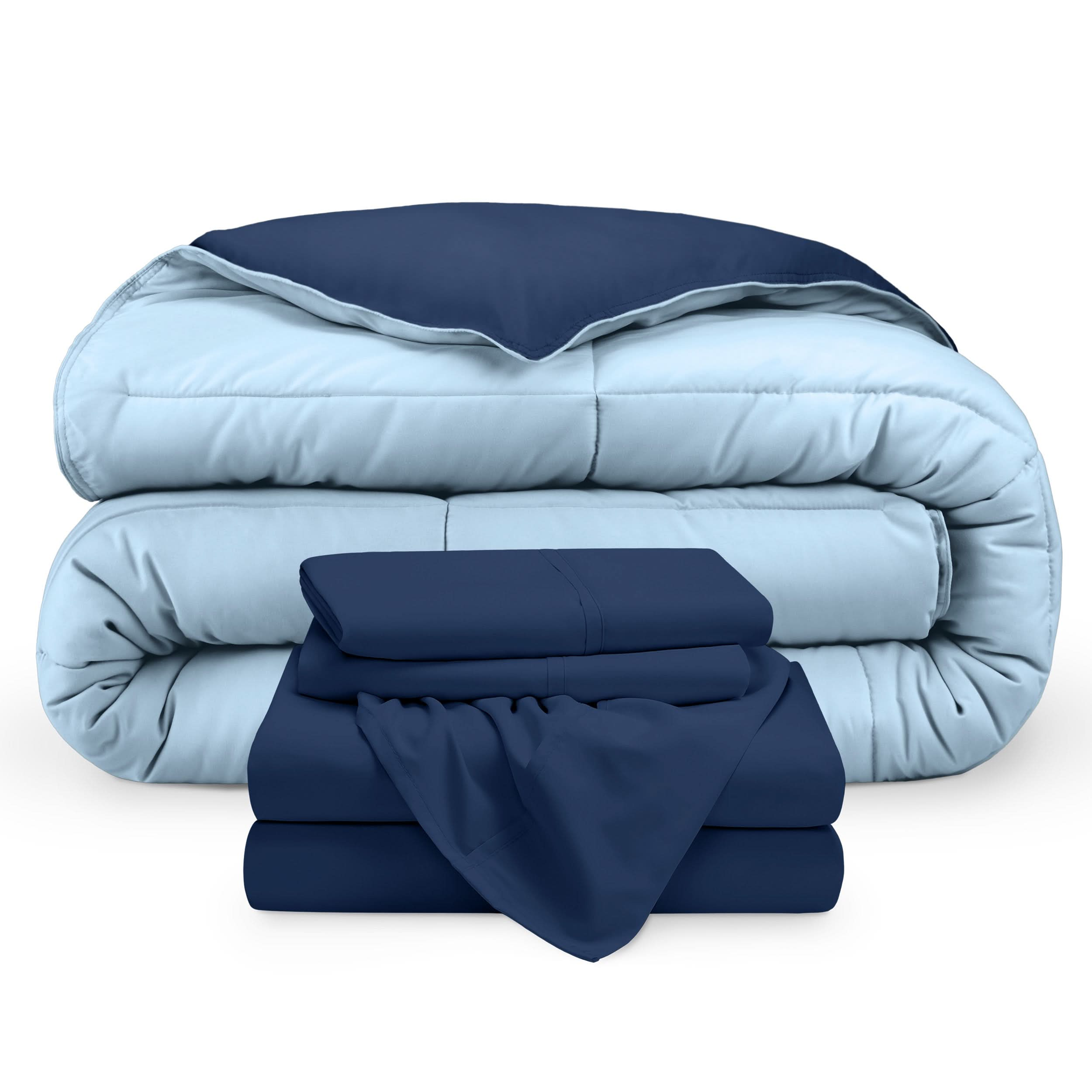 A reversible microfiber comforter and a coordinating sheet set folded and stacked