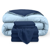 A reversible microfiber comforter and a coordinating sheet set folded and stacked