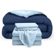 A reversible microfiber comforter and a coordinating sheet set folded and stacked