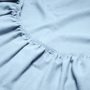 Close-up of flannel fitted sheet.
