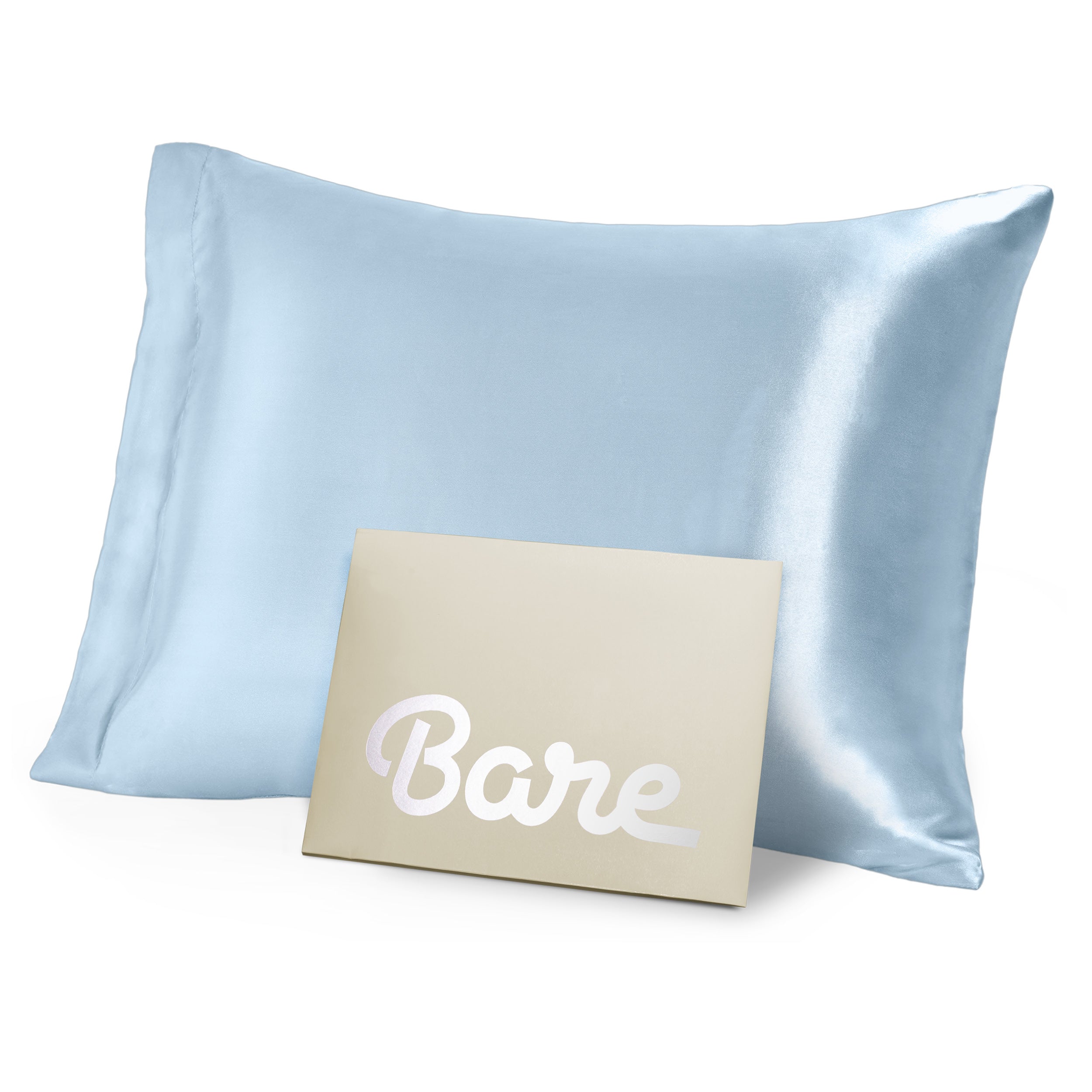 A blue mulberry silk pillowcase on a pillow