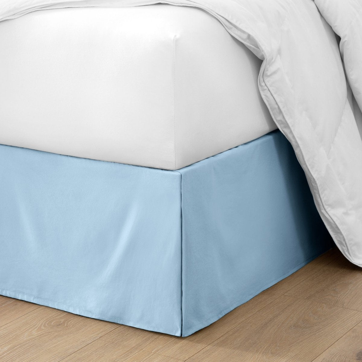 Ultra soft bed skirt on a bed with white bedding.