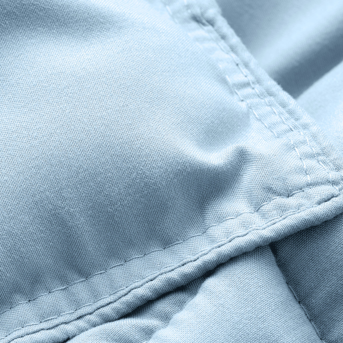 Close-up of comforter fabric with stitching detail