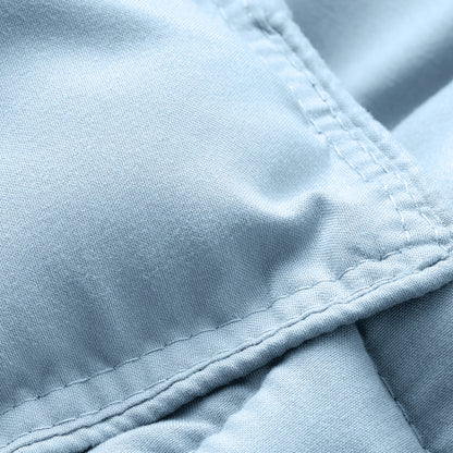 Close-up of comforter fabric with stitching detail