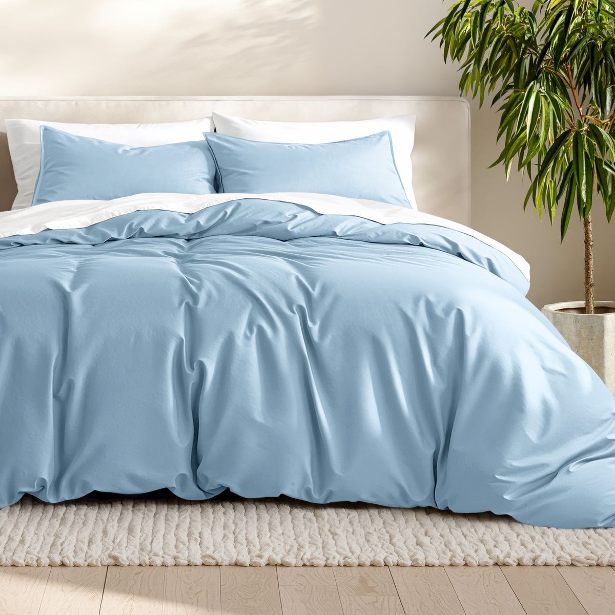 Microfiber bedding set on a bed with a neutral background