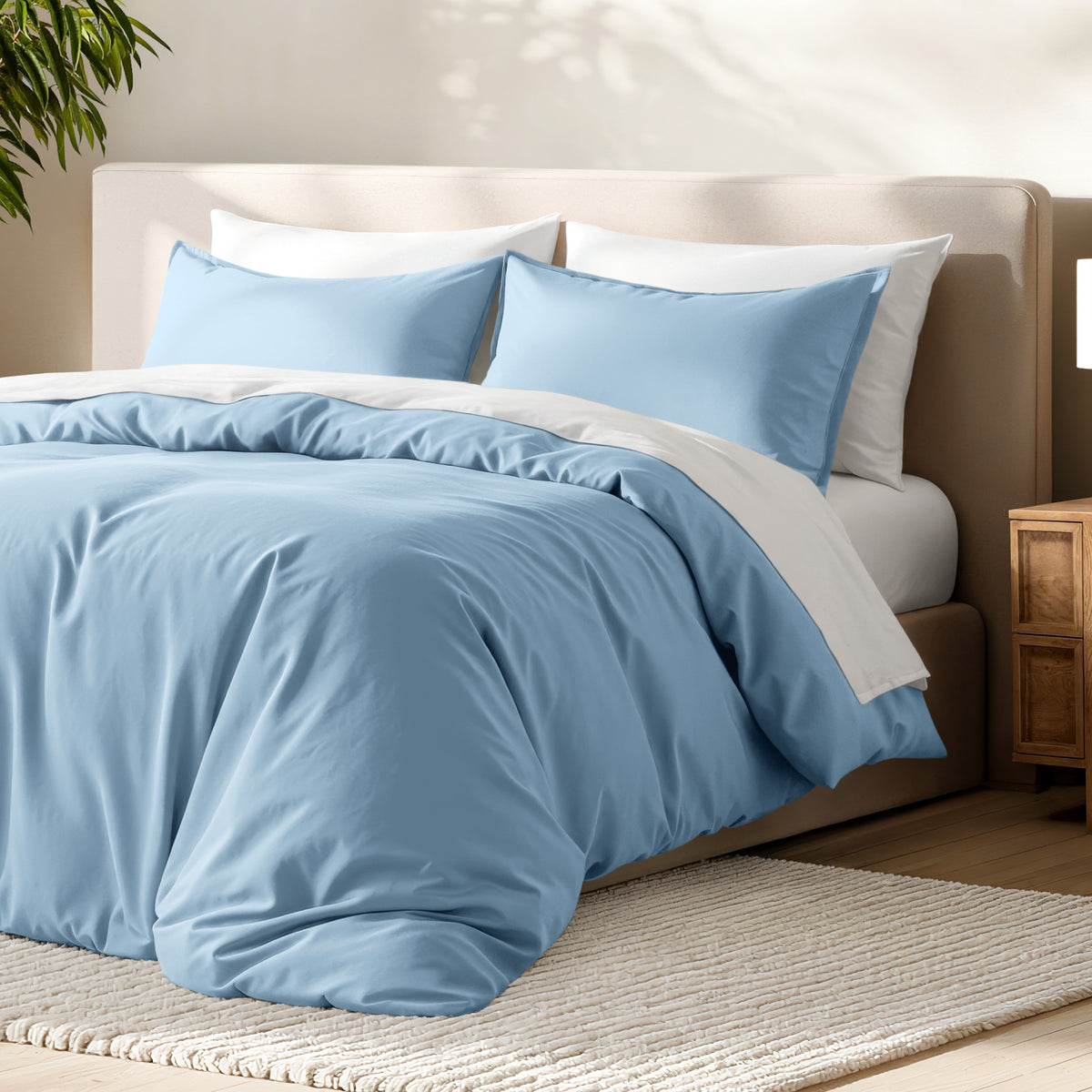 Bed with microfiber duvet cover and sham set in a bedroom setting.