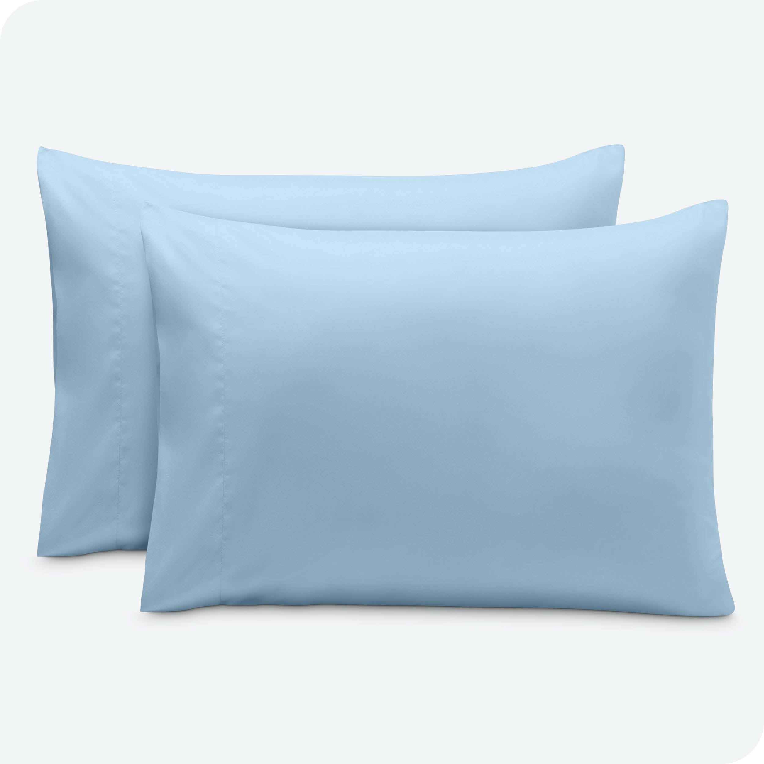 2 pillowcases on pillows