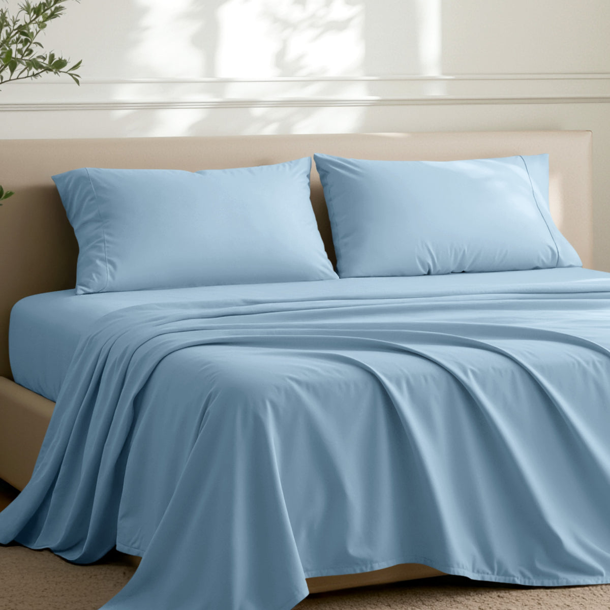 2 pillowcases on pillows on a nicely made bed
