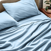 Close up of a microfiber sheet set on a bed