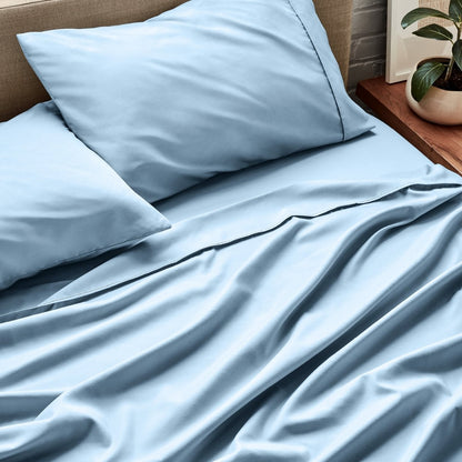 Close up of ultra-soft sheets on a bed