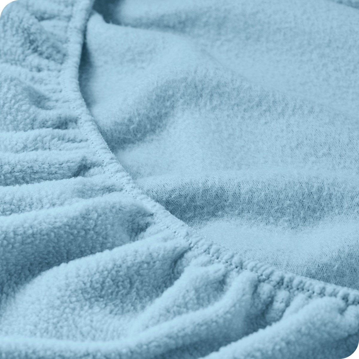 Close up of the elastic portion of a fleece fitted sheet