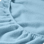 Close up of the elastic portion of a fleece fitted sheet