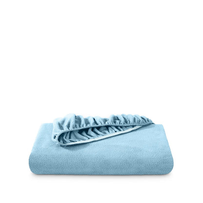 Polar fleece fitted sheet folded on a white background