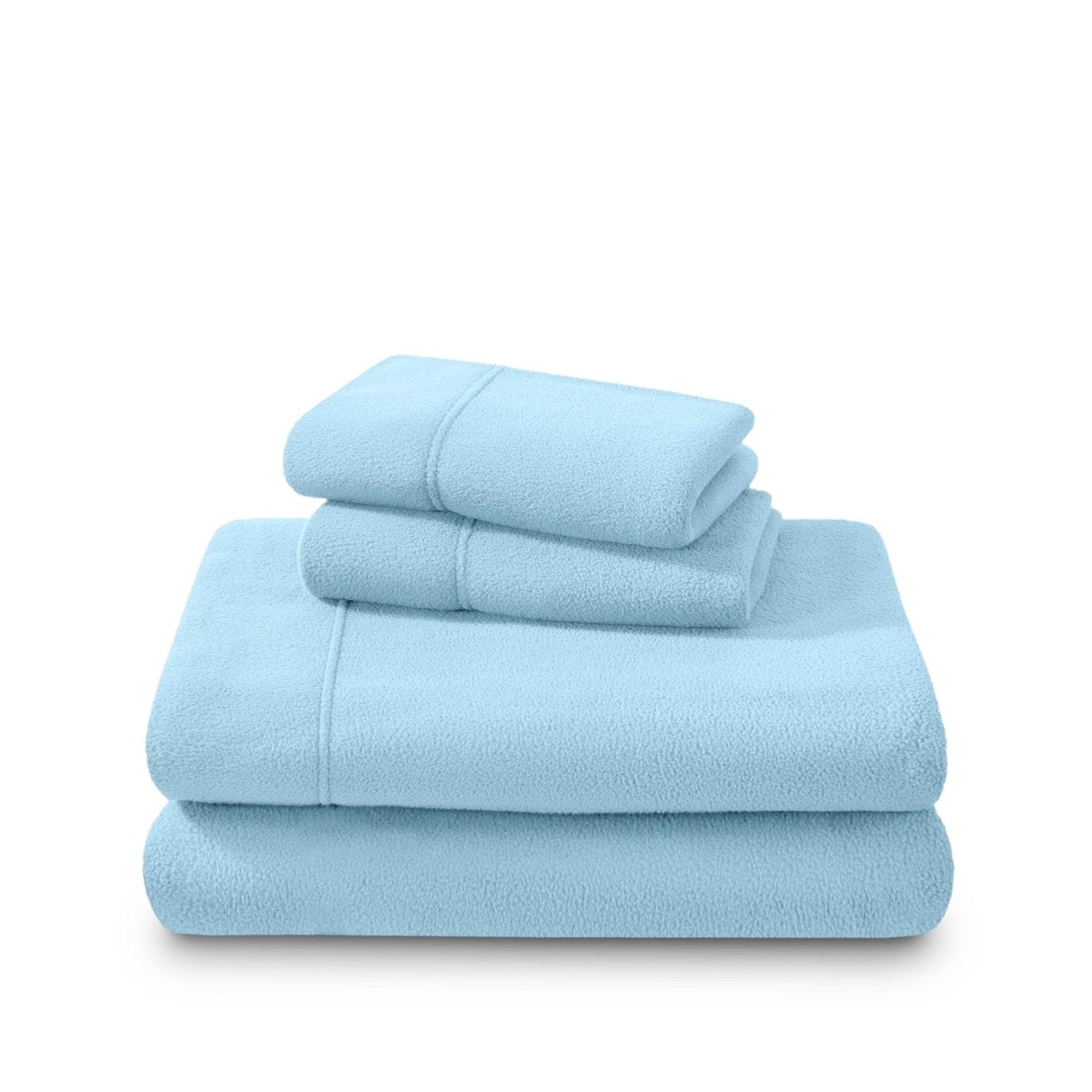 Polar fleece sheets and pillowcases folded and stacked on a white background