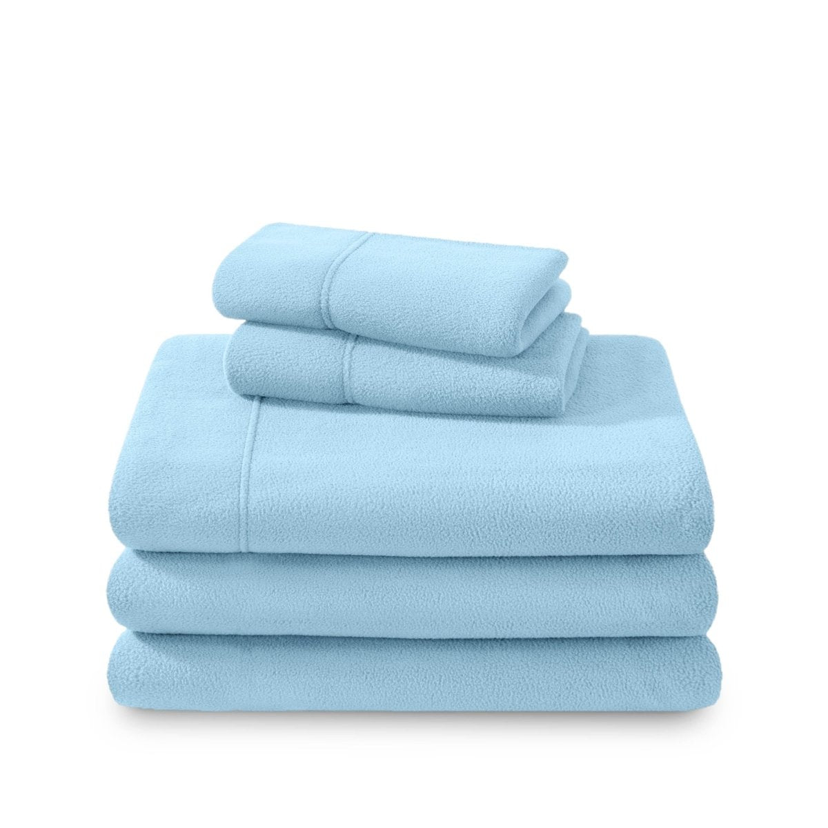 Polar fleece sheets and pillowcases folded and stacked on a white background