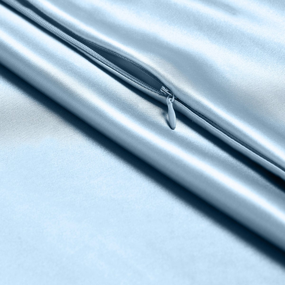 Close-up of poly satin pillowcase with a zipper