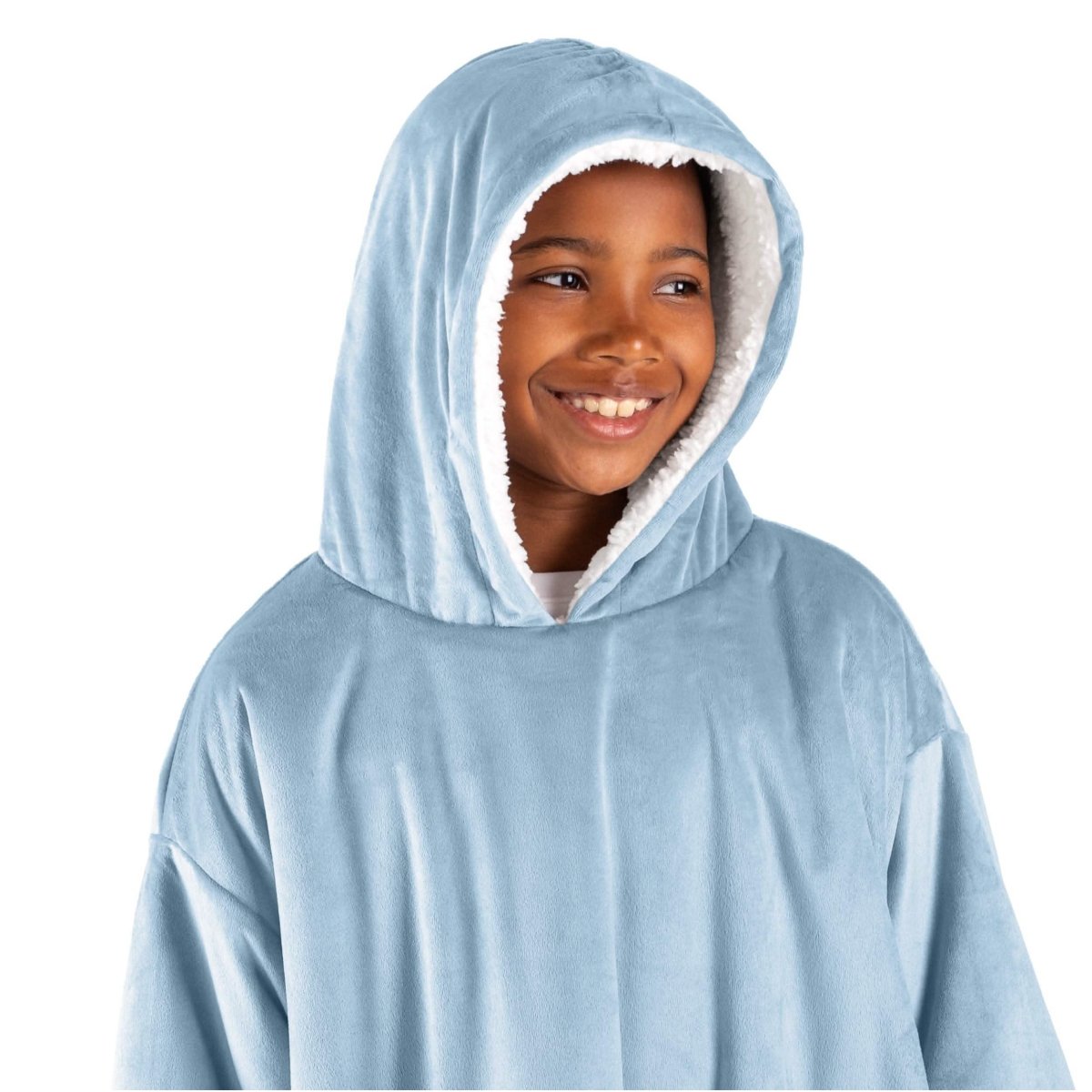 A child with a wearable blanket on