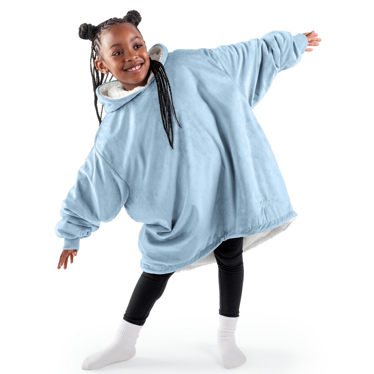 A youth wearable blanket on a child