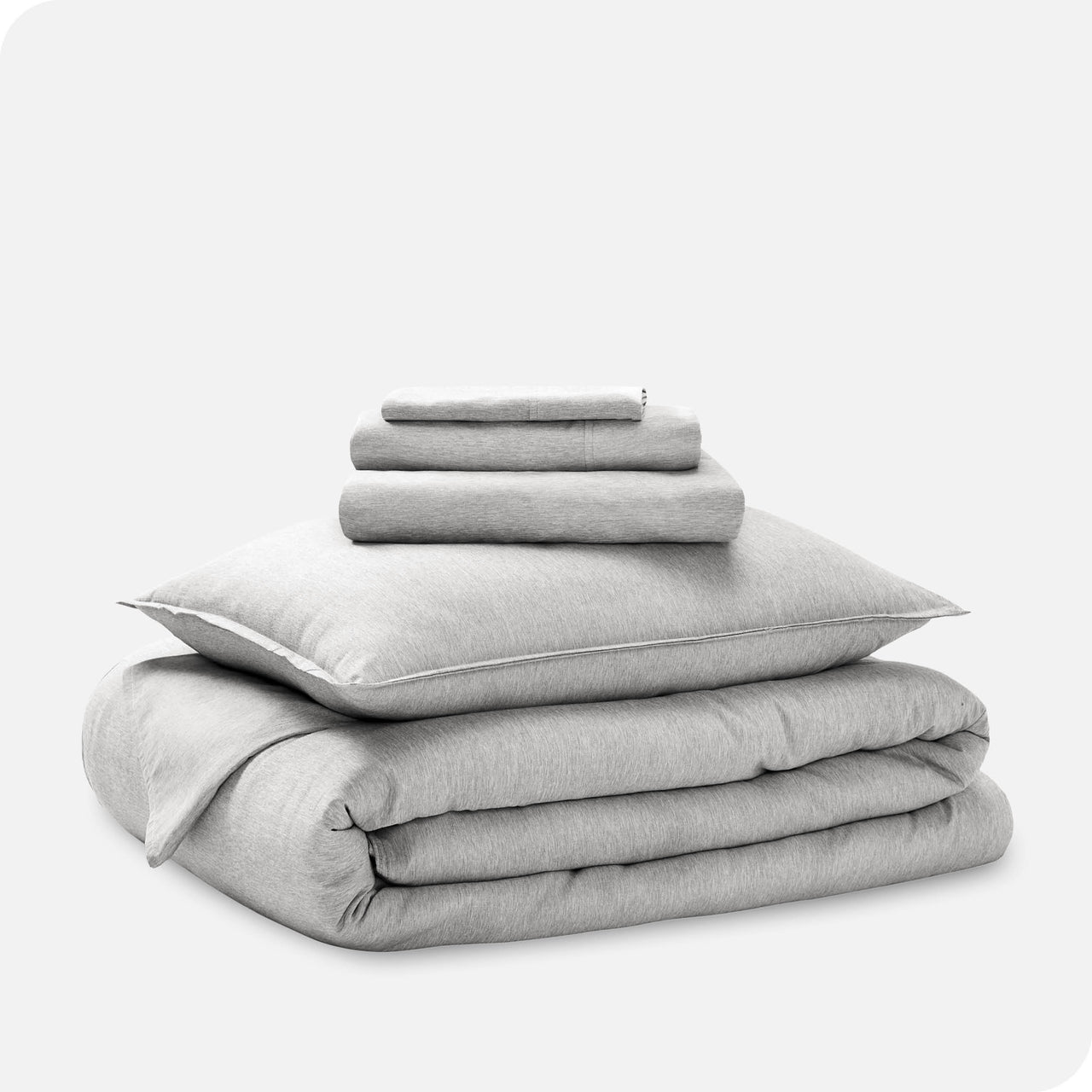 https://barehome.com/cdn/shop/files/LightGreyHeathered_MF_BedSet_6-1Pillow_1280x.jpg?v=1702490996