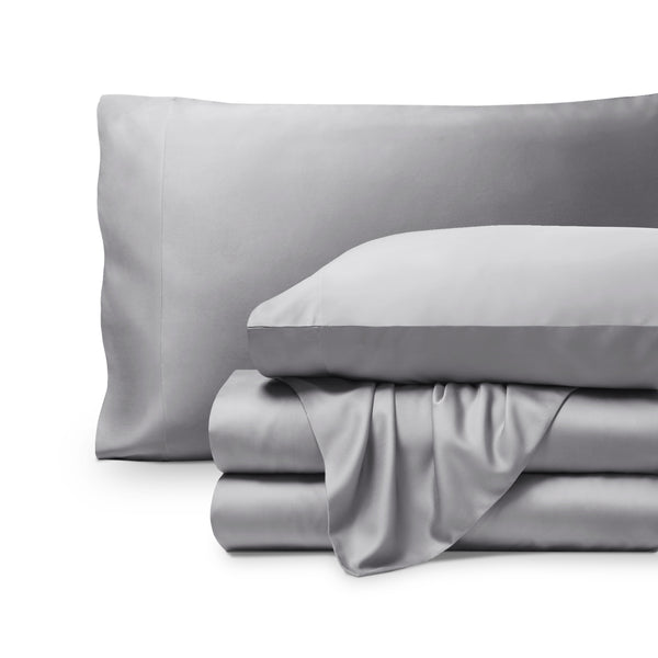 Bamboo pillowcases and sheets set on a white background