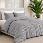 Bedding set with duvet cover and pillow shams on a white background