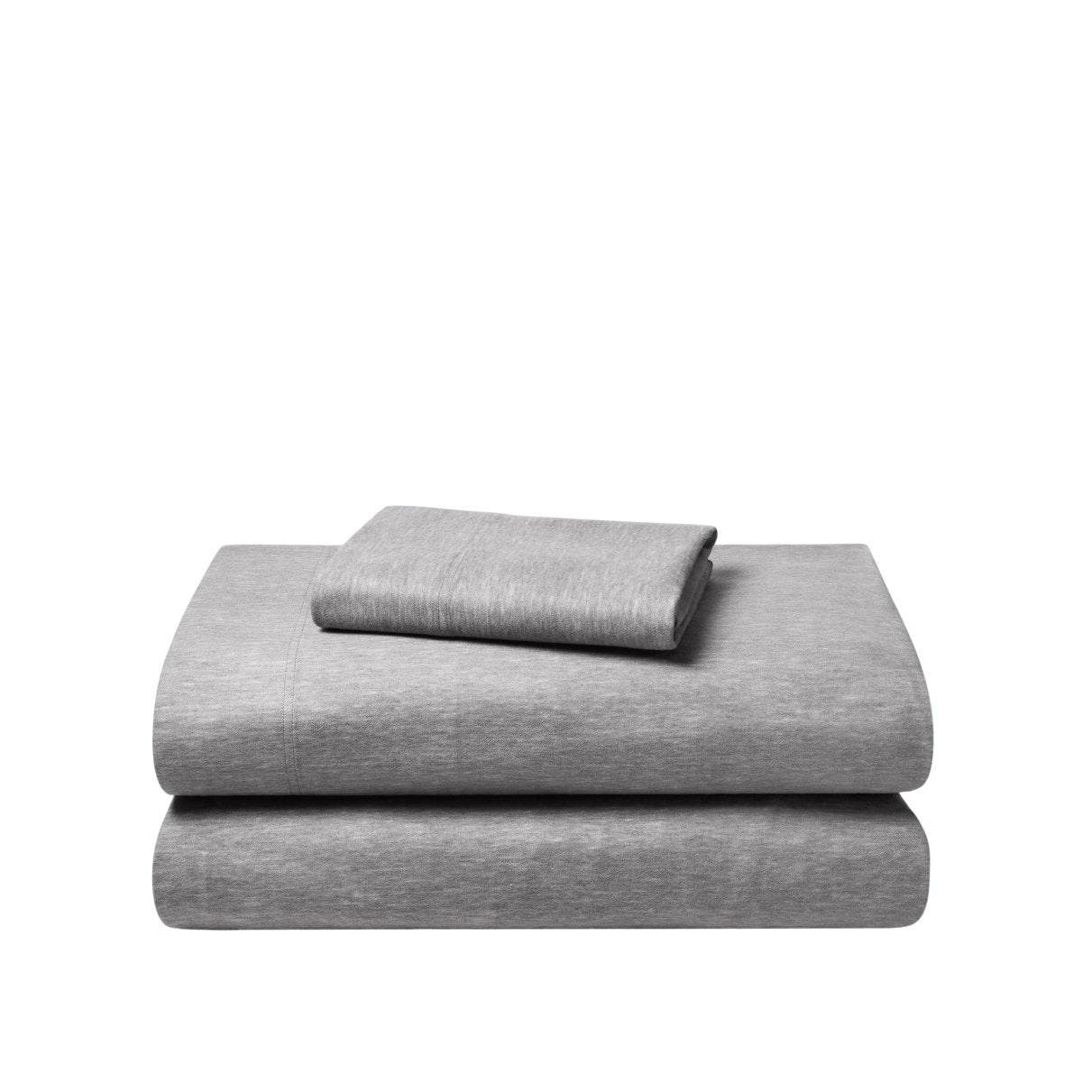 Set of flannel bed sheets on a white background