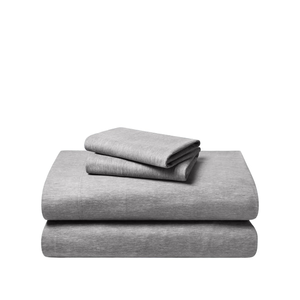 Set of flannel bed sheets on a white background