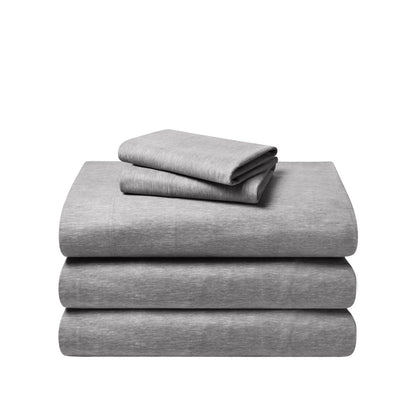 Set of flannel bed sheets on a white background