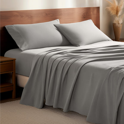 Flannel bedding set on a bed with a wooden headboard and side table