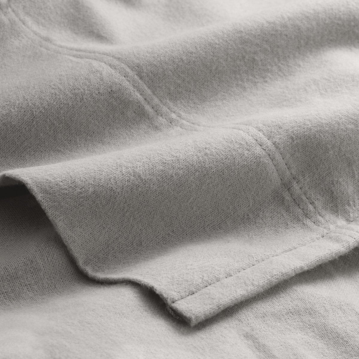 Close-up of flannel fabric with a focus on texture and color.