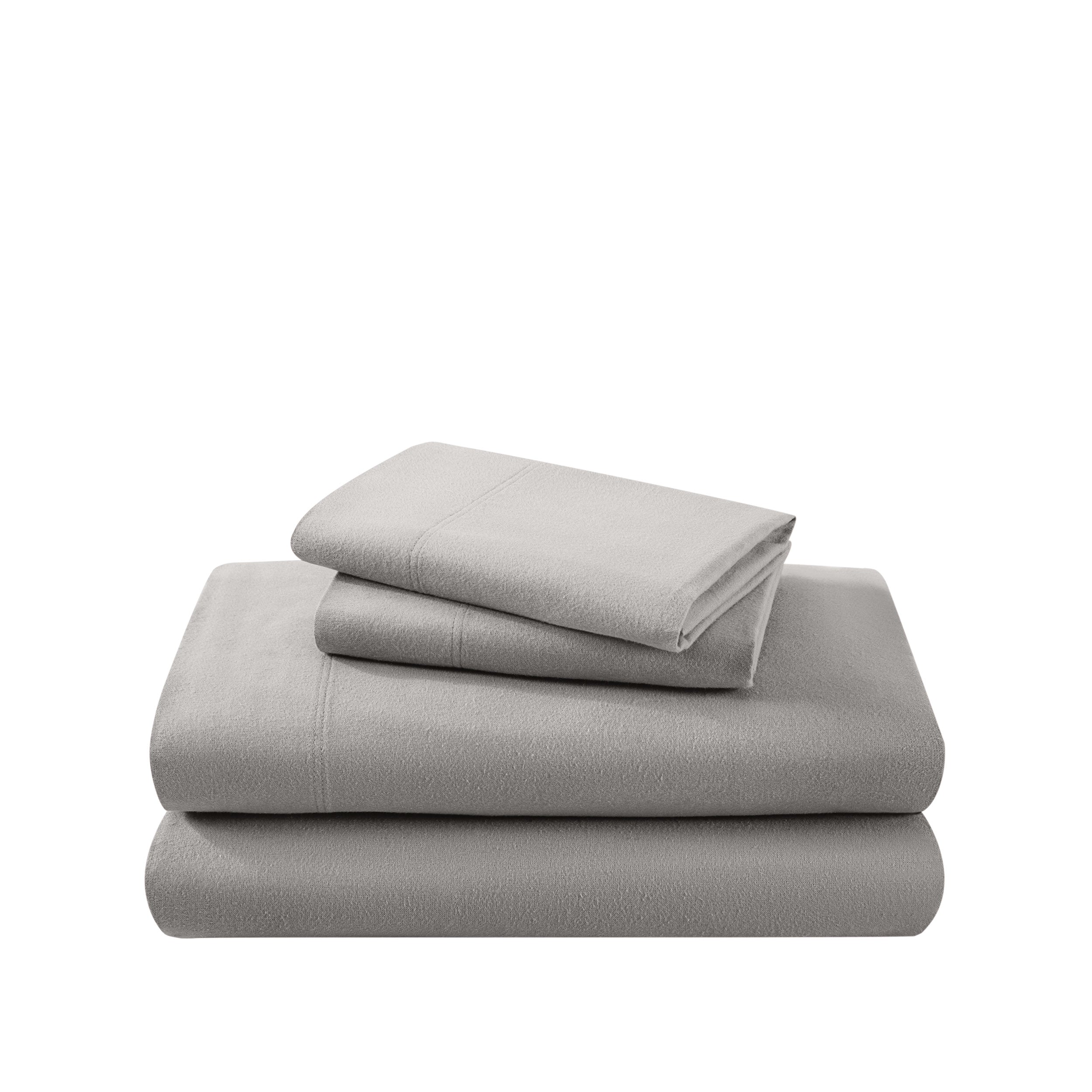Cotton flannel sheet set folded and stacked on a white background