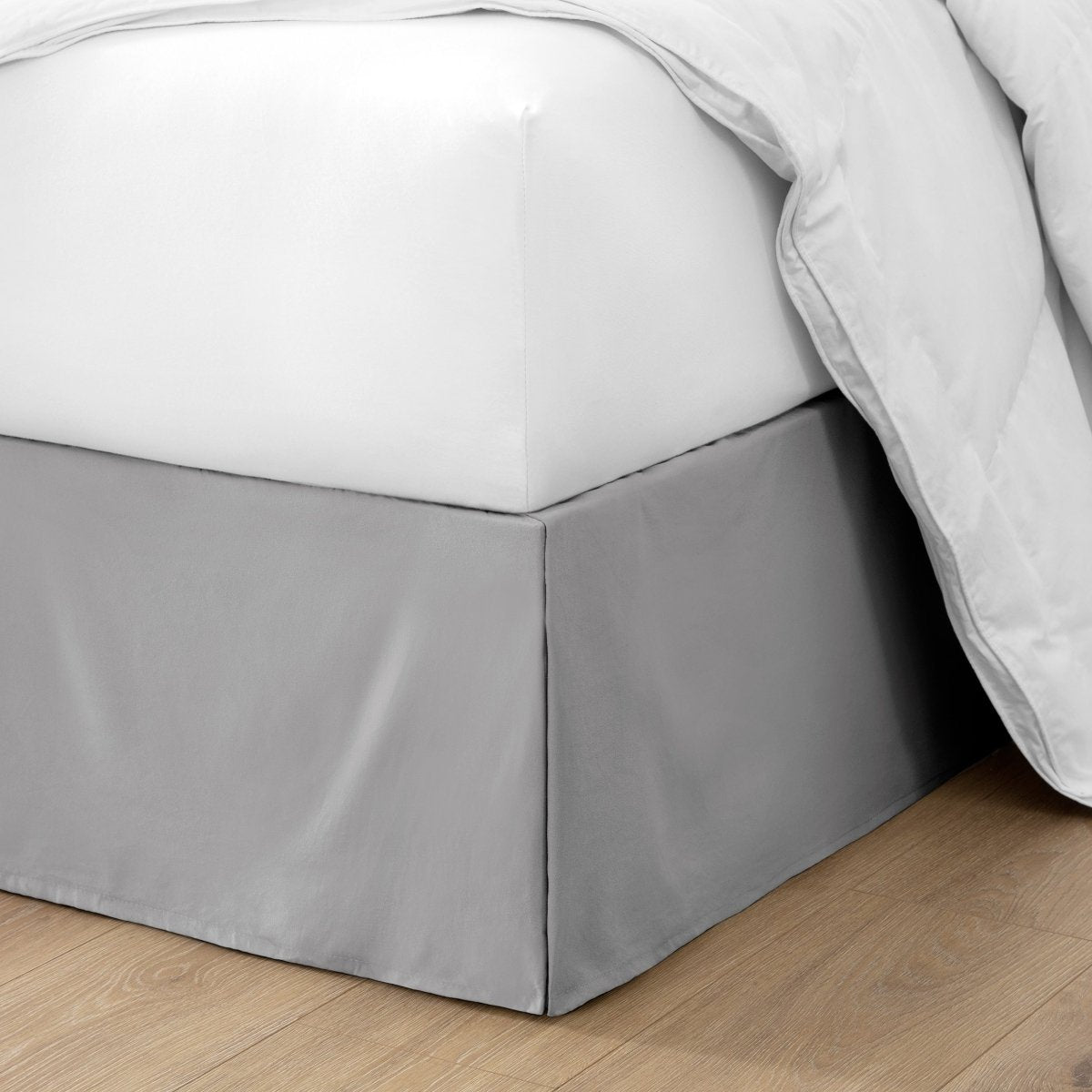 Ultra soft bed skirt on a bed with white bedding.