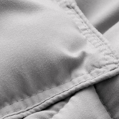 Close-up of comforter fabric with stitching detail