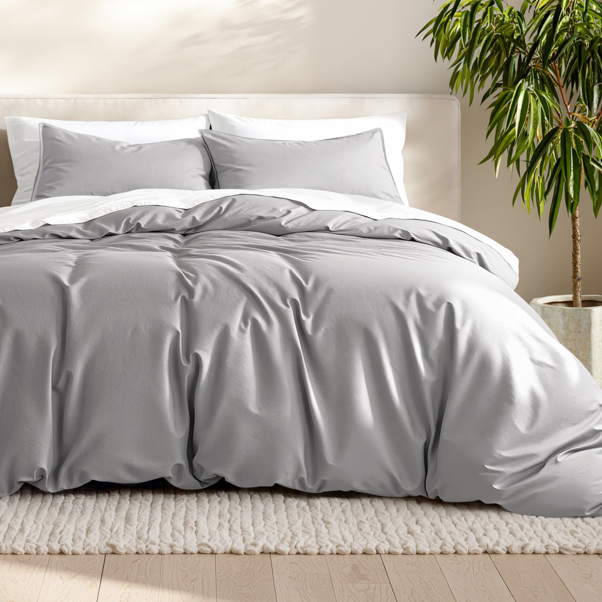 Microfiber bedding set on a bed with a neutral background