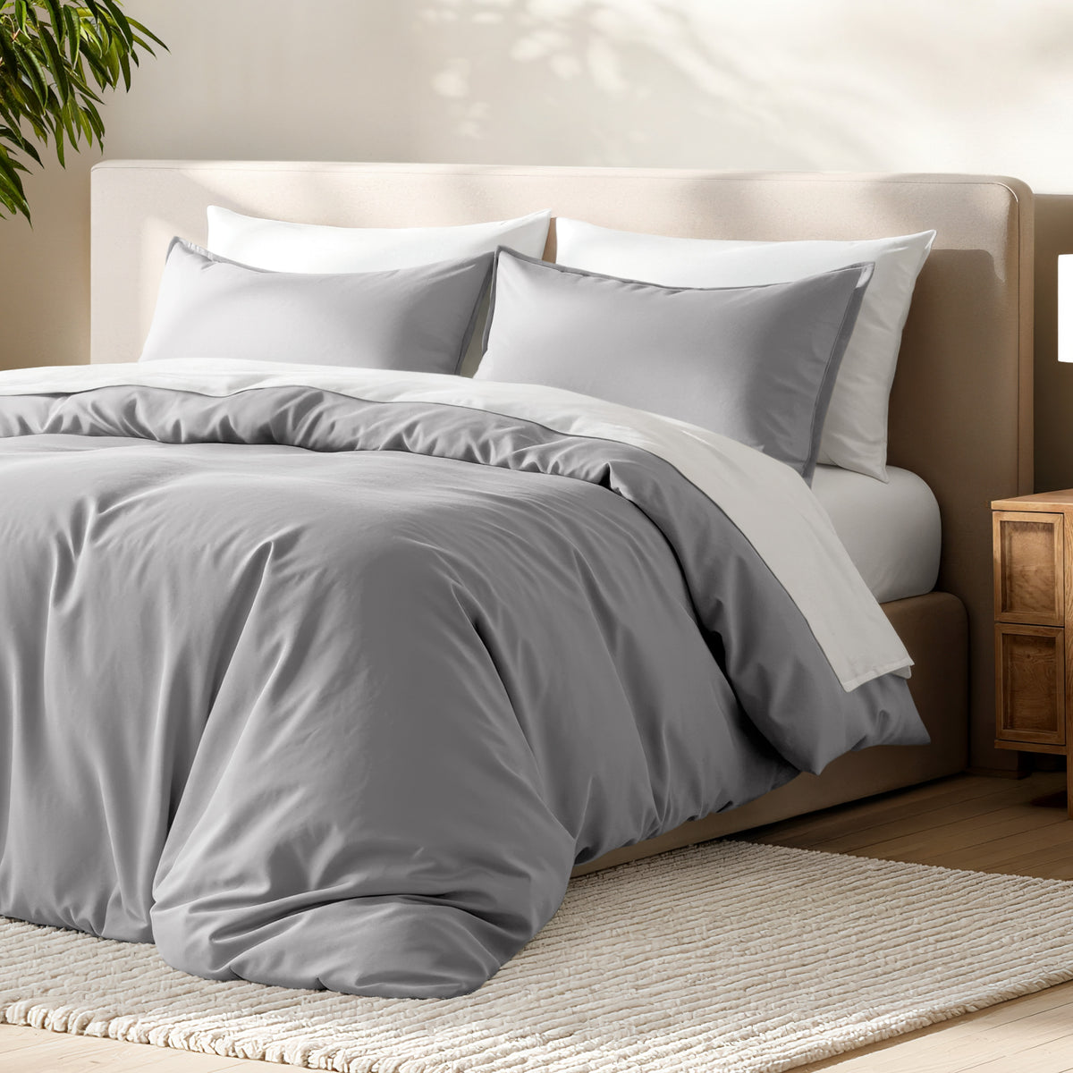 Bed with microfiber duvet cover and sham set in a bedroom setting.