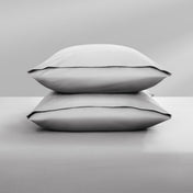 Two pillowcases on top of a bed