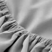 Close-up of elastic on a fitted sheet.