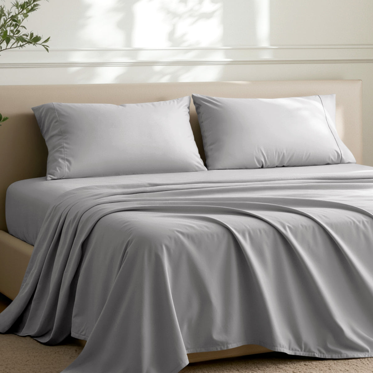 2 pillowcases on pillows on a nicely made bed