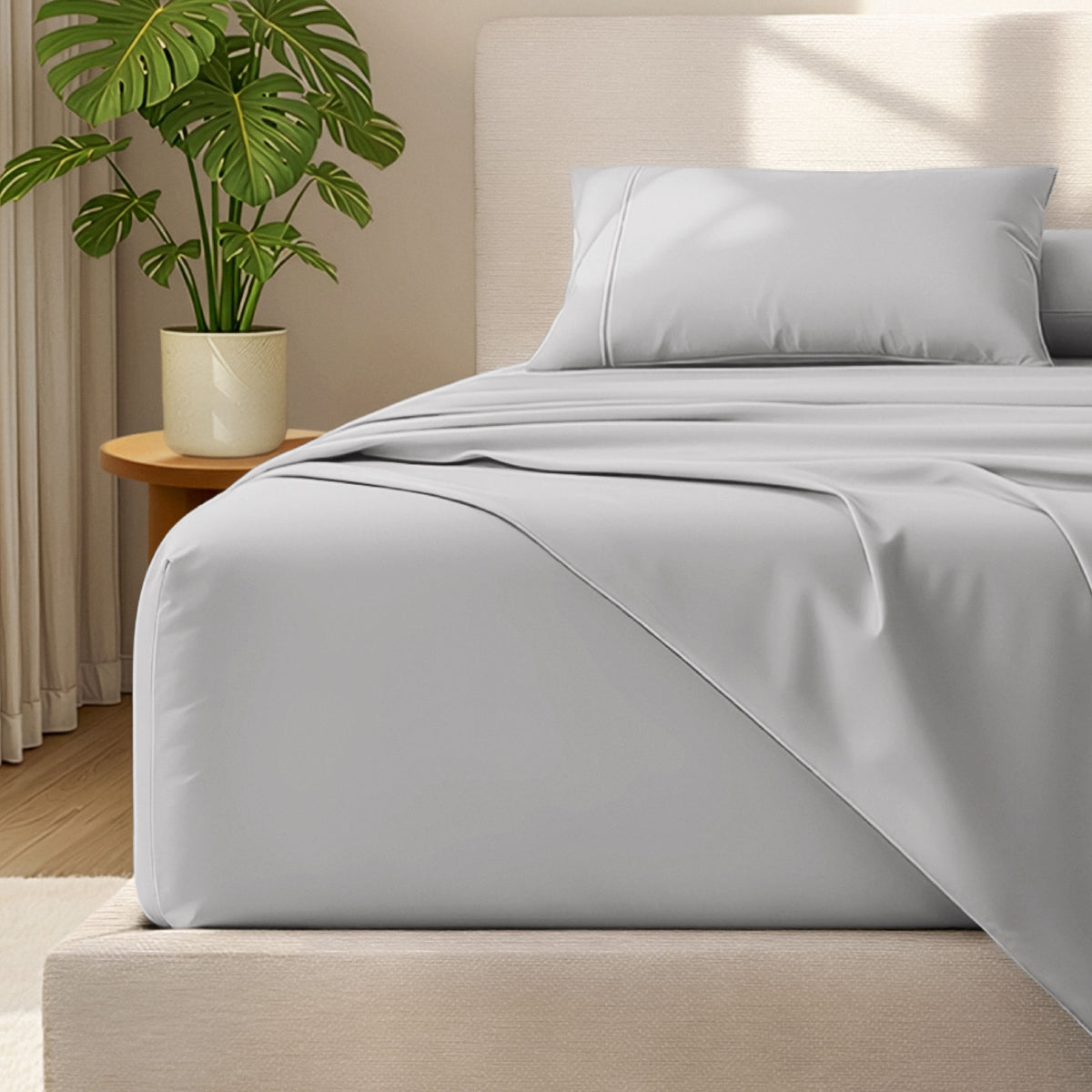 Bed with microfiber bedding and wooden headboard in a bedroom setting