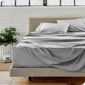A modern bedroom with microfiber sheets on the mattress